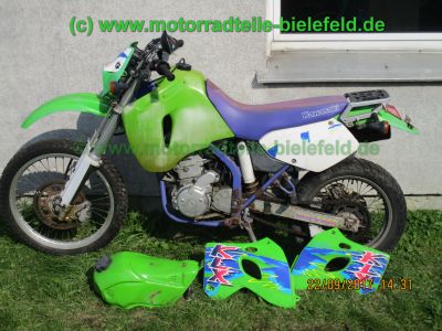 Kawasaki_KLX650C_Hard-Enduro_gruen_1Hd_33kW_EZ93_ausser_Betrieb_2006_USD-Gabel_grosser_Acerbis-Tank_Motor_-1.jpg