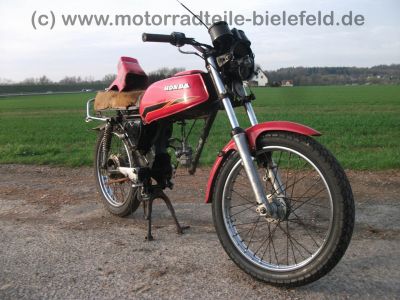 Honda_CB_125_T_Twin_Speiche_rot_teilzerlegt_-_wie_CB_CM_125_185_250_K_T_Twin_C_62.jpg