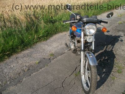 Honda_CB_400_T_blau_orig__Auspuff_HM_413_414_Gepaecktraeger_-_wie_CB_CM_250_400_450_T_N_93.jpg