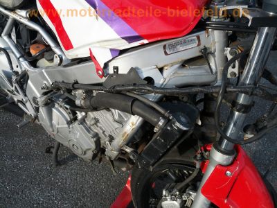 Honda_CBR_600_F_PC25_rot-weiss_CRASH_Hinterrad_7-Speichen_ENKEI_17_x_4_50_-_Auspuff__HM_MV9_E1_35.jpg