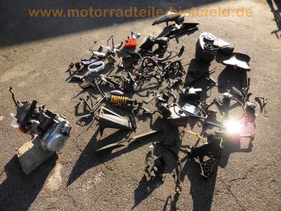 Yamaha_YZF-R_125_RE06_Ersatz-Teile_spare-parts_Heck_Motor_Rasten_etc__1.jpg