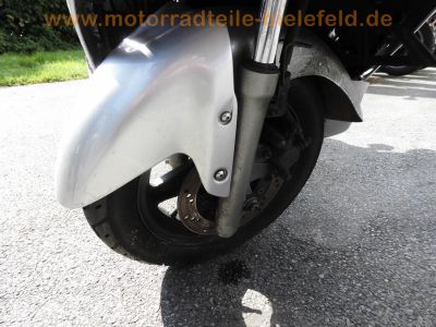 Suzuki_UC125_Epicuro_Roller_silber_SJ125T_CRASH_sehr_gepflegt_hohe_Scheibe_27.jpg