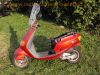 Piaggio_Sfera_125_Four-Stroke_4T_Roller_Scooter_rot_-_Technik_wie_Vespa_ET4_RST_RSL_SKR_50_125_5.jpg